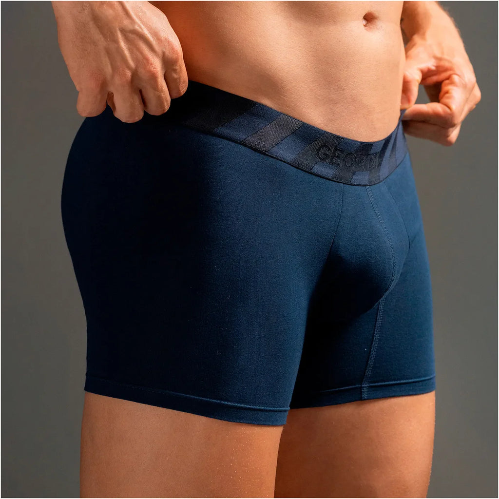 Diane Geordi B2148 navy blue men's boxer brief with wide waistband, Colombian compression garment lifestyle front view