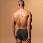 Diane Geordi B2148 dark gray men's boxer brief back view, Colombian compression garment with branded waistband for daily supp
