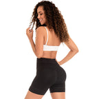 Fajas MyD MYD0322 black high-waist compression shorts, Colombian shapewear post-surgery faja back view curly hair model