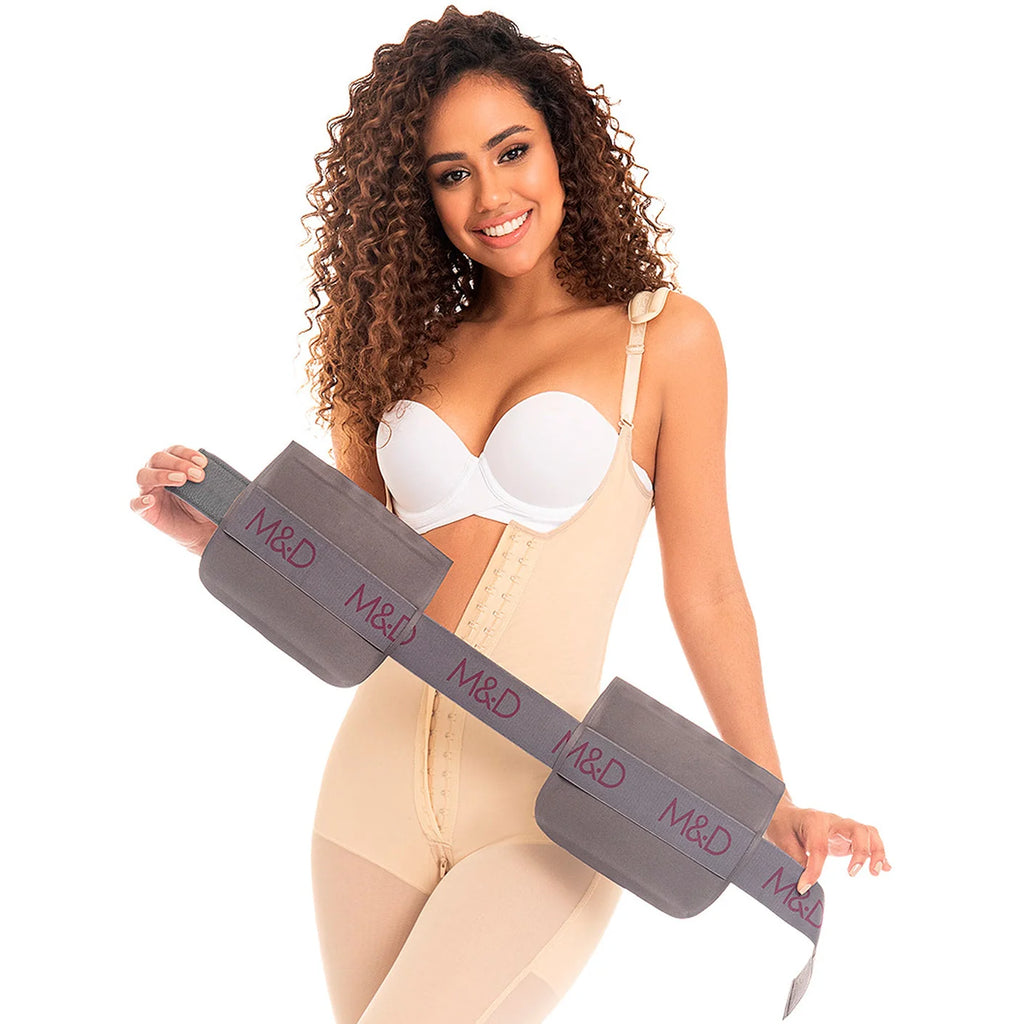 Fajas MyD MYD107 beige full-body Colombian shapewear with gray M&D compression board, post-surgery faja lifestyle view