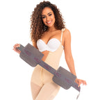 Fajas MyD MYD107 beige full-body Colombian shapewear with gray M&D compression board, post-surgery faja lifestyle view